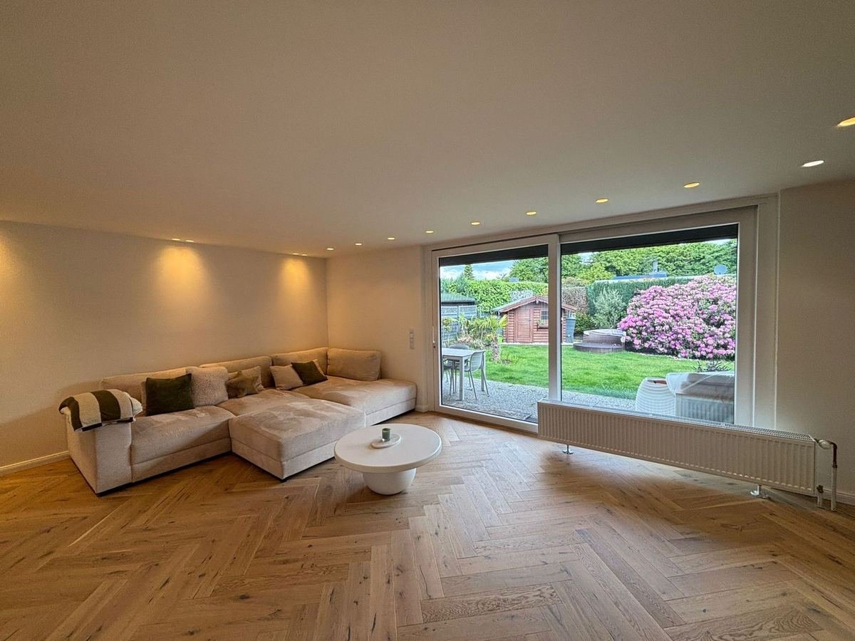 Wohnbereich mit Blick in den Garten, verkaufter Bungalow in Niederkrüchten